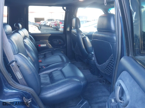 1997 Chevrolet Tahoe with VIN 1GNEK13R4VJ418974, listed as a IAAI auction lot 41560411 with 198,170 mi miles. Bid and sale history available at carsss.com. Image 8.