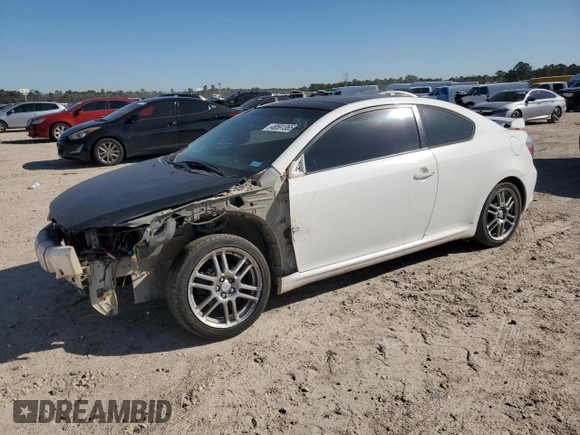 2009 Scion tC with VIN JTKDE167990297899, listed as a Copart auction lot 48591365 with 122,056 mi miles and Salvage Title. Bid and sale history available at carsss.com. Image 1.