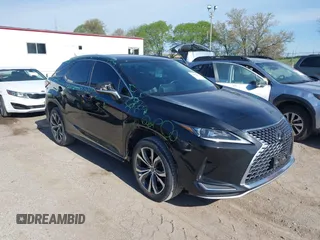 2020 Lexus RX 350 z VIN 2T2HZMAAXLC161890, wystawiony jako IAAI lot #42182084 z przebiegiem 92 081 mil mil oraz . Historia ofert i sprzedaży dostępna na DreamBid. Obrazek 1.