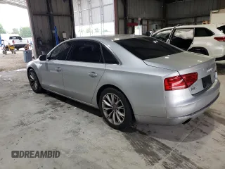 2012 Audi A8 z VIN WAURVAFD4CN038599, wystawiony jako Copart lot #59554025 z przebiegiem 93 334 mil mil oraz Szkoda całkowita • Salvage title. Historia ofert i sprzedaży dostępna na DreamBid. Obrazek 2.