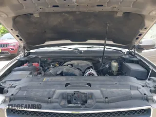 2007 Chevrolet Tahoe LT z VIN 1GNFC130X7R263516, wystawiony jako IAAI lot #42259629 z przebiegiem 215 970 mil mil oraz . Historia ofert i sprzedaży dostępna na DreamBid. Obrazek 10.