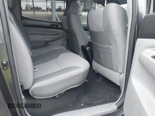 2014 Toyota Tacoma z VIN 3TMMU4FN9EM066292, wystawiony jako IAAI lot #41542492 z przebiegiem 122 308 mil mil oraz . Historia ofert i sprzedaży dostępna na DreamBid. Obrazek 8.