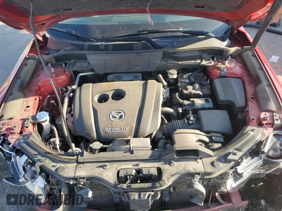 2018 Mazda CX-5 Grand Touring z VIN JM3KFBDMXJ0390680, wystawiony jako Copart lot #51654345 z przebiegiem 67 167 mil mil oraz Szkoda całkowita • Salvage title. Historia ofert i sprzedaży dostępna na DreamBid. Obrazek 13.