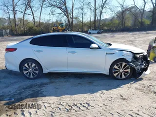 2016 Kia Optima SX Turbo with VIN 5XXGW4L2XGG084628, listed as a IAAI auction lot 41668592 with 116,535 mi miles and . Bid and sale history available at carsss.com. Image 13.
