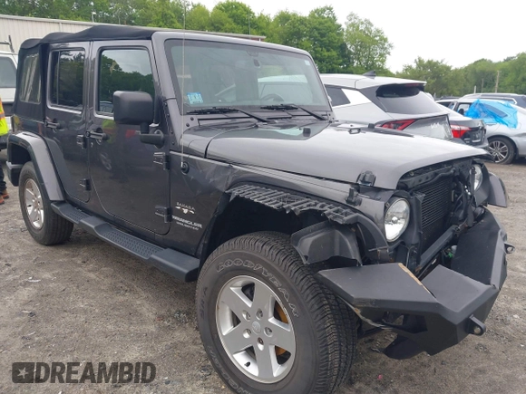 2016 Jeep Wrangler Unlimited Sahara z VIN 1C4HJWEG1GL252860, wystawiony jako IAAI lot #42215620 z przebiegiem 85 267 mil mil oraz . Historia ofert i sprzedaży dostępna na DreamBid. Obrazek 1.