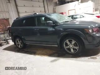 2017 Dodge Journey Crossroad Plus z VIN 3C4PDDGG9HT579758, wystawiony jako IAAI lot #42237895 z przebiegiem 134 602 mil mil oraz . Historia ofert i sprzedaży dostępna na DreamBid. Obrazek 13.