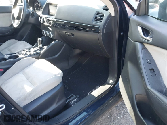 2016 Mazda CX-5 Sport with VIN JM3KE2BY3G0657904, listed as a IAAI auction lot 42127897 with 153,855 mi miles. Bid and sale history available at carsss.com. Image 5.