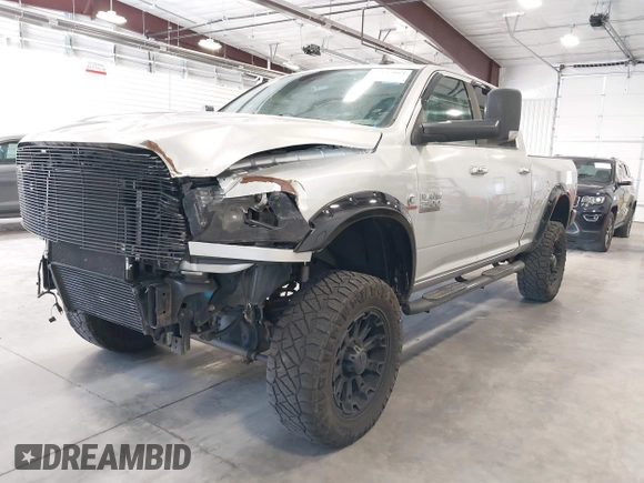 2015 Ram 2500 SLT with VIN 3C6UR5DL4FG614148, listed as a IAAI auction lot 42137073 with 172,705 mi miles. Bid and sale history available at carsss.com. Image 2.