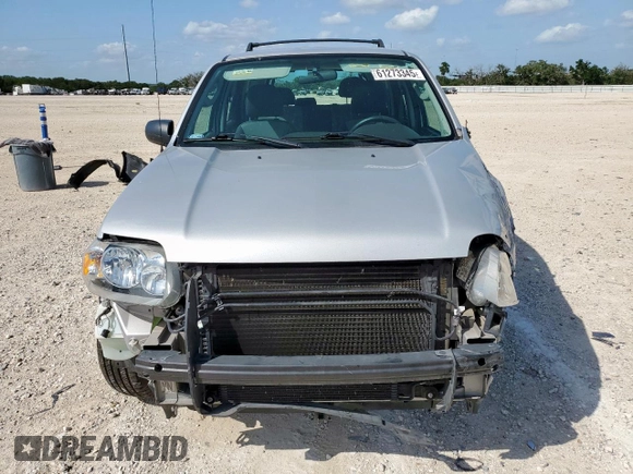 2007 Ford Escape XLS with VIN 1FMYU02Z87KB60530, listed as a Copart auction lot 61273345 with 57,574 mi miles and Salvage title. Bid and sale history available at DreamBid. Image 5.