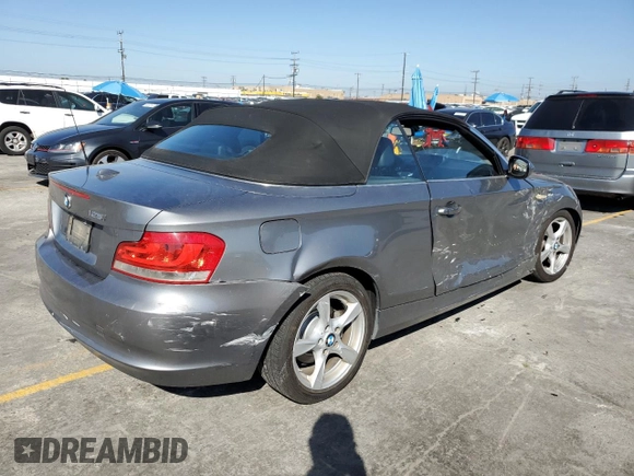 2012 BMW 1 Series 128i with VIN WBAUN1C5XCVR00151, listed as a Copart auction lot 56040445 with 171,302 mi miles and Salvage title. Bid and sale history available at DreamBid. Image 3.