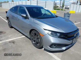 2019 Honda Civic Sedan Sport with VIN 2HGFC2F82KH519464, listed as a IAAI auction lot 41940030 with 59,718 mi miles. Bid and sale history available at carsss.com. Image 1.