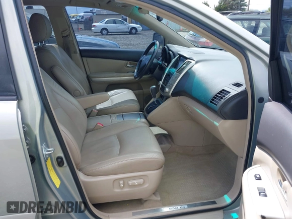 2006 Lexus RX 400h z VIN JTJHW31U860010706, wystawiony jako IAAI lot #42286504 z przebiegiem 220 671 mil mil oraz . Historia ofert i sprzedaży dostępna na DreamBid. Obrazek 5.