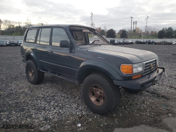 1996 Toyota Land Cruiser with VIN JT3HJ85JXT0142784, listed as a Copart auction lot 81755434 with 370,361 mi miles and Salvage Title. Bid and sale history available at carsss.com. Image 4.