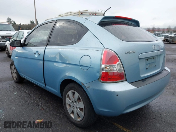 2008 Hyundai Accent GS with VIN KMHCM36C58U094977, listed as a IAAI auction lot 41495883 with 160,708 mi miles. Bid and sale history available at carsss.com. Image 3.