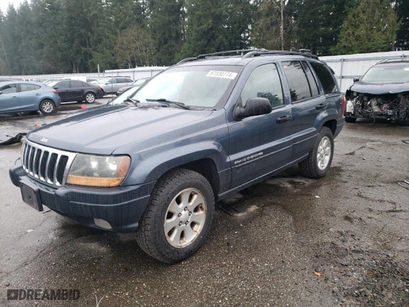 2001 Jeep Grand Cherokee Laredo with VIN 1J4GW48N91C560288, listed as a Copart auction lot 87030774 with 157,544 mi miles and Salvage Title. Bid and sale history available at carsss.com. Image 1.