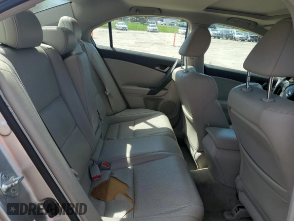 2010 Acura TSX z VIN JH4CU2F62AC035744, wystawiony jako Copart lot #55705774 z przebiegiem Nie podano mil oraz Szkoda całkowita • Salvage title. Historia ofert i sprzedaży dostępna na DreamBid. Obrazek 10.