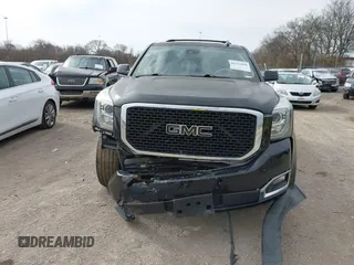 2016 GMC Yukon SLT with VIN 1GKS1BKC3GR272738, listed as a IAAI auction lot 41712439 with 169,726 mi miles. Bid and sale history available at carsss.com. Image 12.