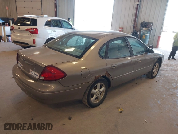 2003 Ford Taurus SES Standard with VIN 1FAFP55293G272187, listed as a IAAI auction lot 42154599 with 225,077 mi miles. Bid and sale history available at carsss.com. Image 4.