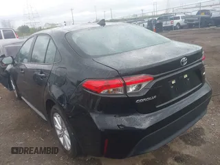 2023 Toyota Corolla LE with VIN 5YFB4MDE1PP058774, listed as a IAAI auction lot 42068978 with 19,802 mi miles and . Bid and sale history available at DreamBid. Image 3.