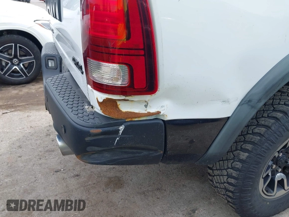 2016 Ram 1500 Rebel with VIN 1C6RR7YTXGS417801, listed as a IAAI auction lot 42382016 with 142,636 mi miles and . Bid and sale history available at DreamBid. Image 17.