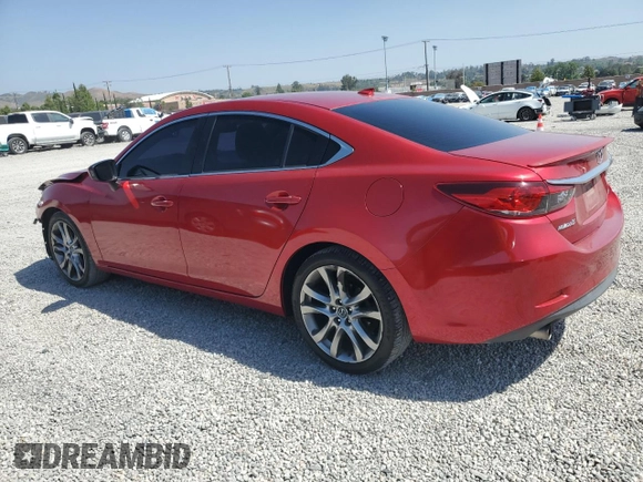 2014 Mazda 6 i Grand Touring с VIN JM1GJ1W64E1121399, выставлен на аукционе Copart как лот 57513405 с пробегом 161 286 миль миль и Списание • Salvage title. История ставок и продаж доступна на DreamBid. Изображение 2.