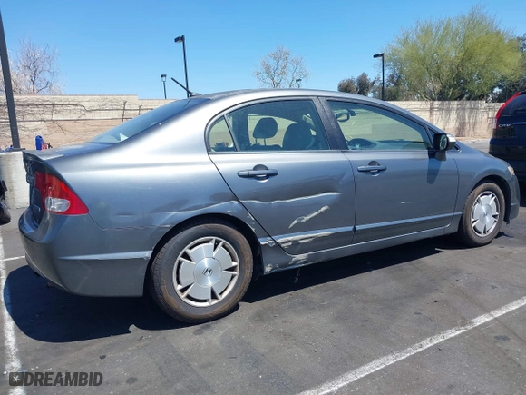 2010 Honda Civic Hybrid with VIN JHMFA3F29AS005350, listed as a IAAI auction lot 41966454 with 145,058 mi miles. Bid and sale history available at carsss.com. Image 6.