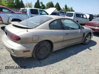 2002 Pontiac Sunfire SE z VIN 1G2JB124327288986, wystawiony jako Copart lot #64072634 z przebiegiem 122 306 mil mil oraz Szkody całkowita. Historia ofert i sprzedaży dostępna na DreamBid. Obrazek 3.
