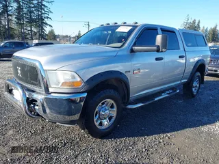 2012 Ram 2500 ST Power Wagon with VIN 3C6TD5CT2CG112567, listed as a IAAI auction lot 41412857 with 133,053 mi miles. Bid and sale history available at carsss.com. Image 2.
