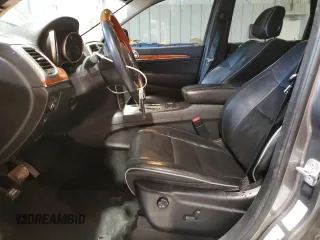2013 Jeep Grand Cherokee Overland with VIN 1C4RJFCT5DC599866, listed as a Copart auction lot 51837395 with 105,521 mi miles and Salvage Title. Bid and sale history available at carsss.com. Image 7.