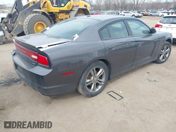 2014 Dodge Charger SXT Plus with VIN 2C3CDXJG0EH230635, listed as a IAAI auction lot 41890555 with 203,869 mi miles. Bid and sale history available at carsss.com. Image 4.
