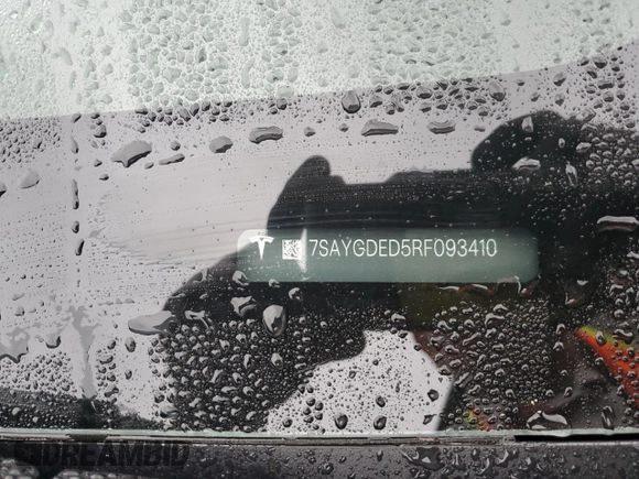2024 Tesla Model Y with VIN 7SAYGDED5RF093410, listed as a Copart auction lot 50557225 with 6,396 mi miles and Salvage Title. Bid and sale history available at DreamBid. Image 15.
