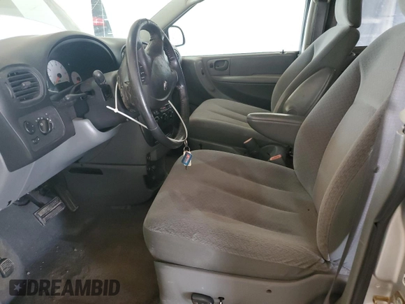 2006 Dodge Grand Caravan SXT z VIN 2D4GP44L26R816439, wystawiony jako Copart lot #52609115 z przebiegiem 127 307 mil mil oraz Szkody całkowita. Historia ofert i sprzedaży dostępna na DreamBid. Obrazek 7.