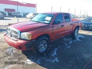2006 Dodge Dakota SLT with VIN 1D7HE48K36S623701, listed as a IAAI auction lot 41695564 with 130,147 mi miles and . Bid and sale history available at carsss.com. Image 2.