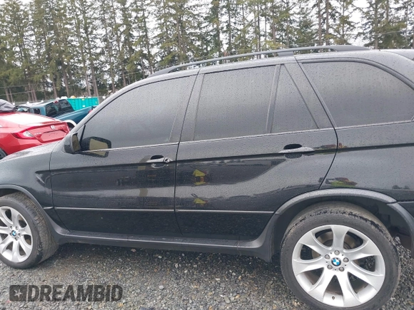 2005 BMW X5 4.8is with VIN 5UXFA93515LE82570, listed as a IAAI auction lot 41759657 with 212,687 mi miles. Bid and sale history available at carsss.com. Image 14.