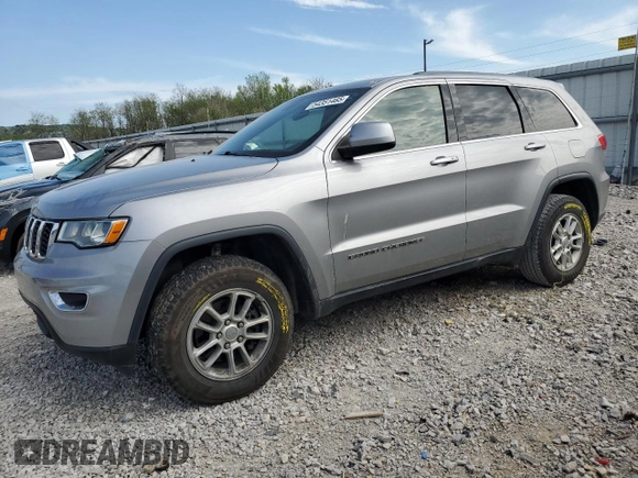 2018 Jeep Grand Cherokee Laredo with VIN 1C4RJFAG4JC122038, listed as a Copart auction lot 54351465 with 101,314 mi miles and Salvage title. Bid and sale history available at DreamBid. Image 1.