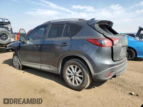 2014 Mazda CX-5 Sport z VIN JM3KE4BE1E0359446, wystawiony jako Copart lot #54562545 z przebiegiem 128 150 mil mil oraz Szkoda całkowita • Salvage title. Historia ofert i sprzedaży dostępna na DreamBid. Obrazek 2.