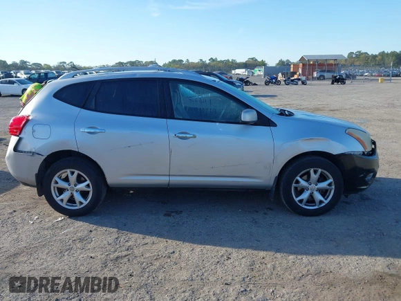 2009 Nissan Rogue SL with VIN JN8AS58T39W047497, listed as a IAAI auction lot 41792950 with 176,931 mi miles and . Bid and sale history available at DreamBid. Image 13.