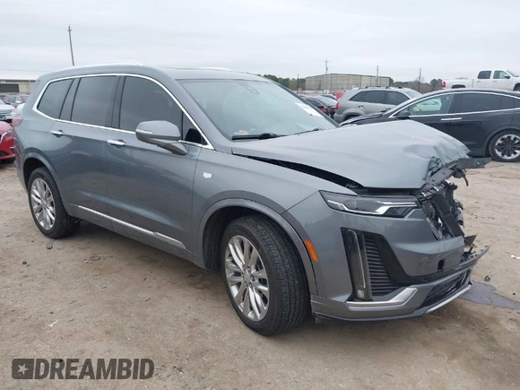 2021 Cadillac XT6 Luxury with VIN 1GYKPAR42MZ137548, listed as a IAAI auction lot 41630991 with 23,793 mi miles. Bid and sale history available at carsss.com. Image 1.