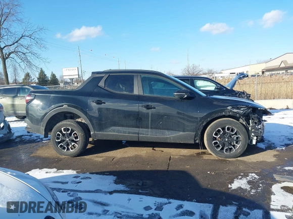 2022 Hyundai Santa Cruz SEL Premium z VIN 5NTJDDAF0NH037208, wystawiony jako IAAI lot #41536366 z przebiegiem 66 096 mil mil oraz . Historia ofert i sprzedaży dostępna na DreamBid. Obrazek 12.