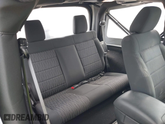 2011 Jeep Wrangler Sport with VIN 1J4AA2D18BL546069, listed as a IAAI auction lot 42139693 with 56,395 mi miles and . Bid and sale history available at carsss.com. Image 8.