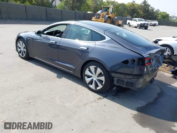 2020 Tesla Model S Long Range with VIN 5YJSA1E24LF415849, listed as a IAAI auction lot 42571945 with 34,398 mi miles and . Bid and sale history available at DreamBid. Image 3.