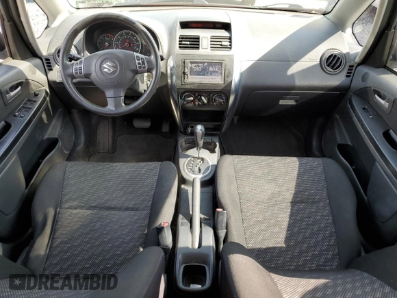 2007 Suzuki SX4 z VIN JS2YB413175106909, wystawiony jako Copart lot #55733055 z przebiegiem 152 703 mil mil oraz Tytuł czysty. Historia ofert i sprzedaży dostępna na DreamBid. Obrazek 8.