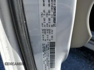 2014 Dodge Grand Caravan SXT z VIN 2C4RDGCG9ER154586, wystawiony jako Copart lot #50262835 z przebiegiem 201 612 mil mil oraz Czysty tytuł • Clean title. Historia ofert i sprzedaży dostępna na DreamBid. Obrazek 13.