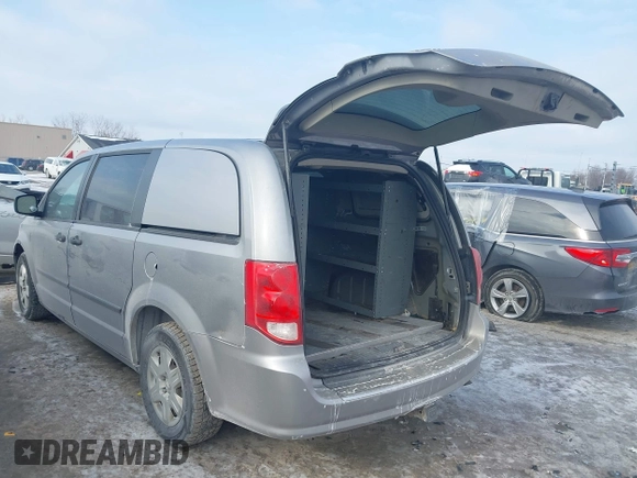 2013 Ram Cargo Van Tradesman with VIN 2C4JRGAG3DR635577, listed as a IAAI auction lot 41318833 with 187,319 mi miles and . Bid and sale history available at DreamBid. Image 3.