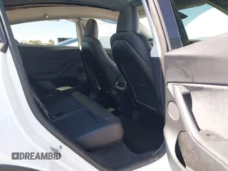 2024 Tesla Model Y Performance with VIN 7SAYGDEF4RF053711, listed as a IAAI auction lot 41836931 with 12,442 mi miles and . Bid and sale history available at DreamBid. Image 8.