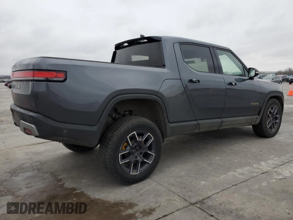 2022 Rivian R1T Launch Edition with VIN 7FCTGAAL7NN002288, listed as a Copart auction lot 43393815 with 46,927 mi miles and Salvage Title. Bid and sale history available at carsss.com. Image 3.