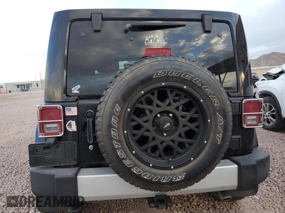 2014 Jeep Wrangler Unlimited Sahara with VIN 1C4BJWEG1EL109197, listed as a Copart auction lot 41699645 with 168,391 mi miles and Salvage Title. Bid and sale history available at carsss.com. Image 6.