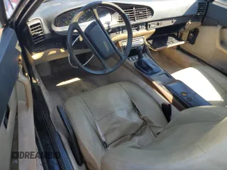 1986 Porsche 944 z VIN WP0AA0942GN460359, wystawiony jako Copart lot #56519965 z przebiegiem 95 915 mil mil oraz Szkoda całkowita • Salvage title. Historia ofert i sprzedaży dostępna na DreamBid. Obrazek 8.