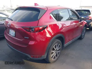 2018 Mazda CX-5 Grand Touring with VIN JM3KFBDM2J0333017, listed as a IAAI auction lot 41850431 with 85,000 mi miles. Bid and sale history available at carsss.com. Image 4.