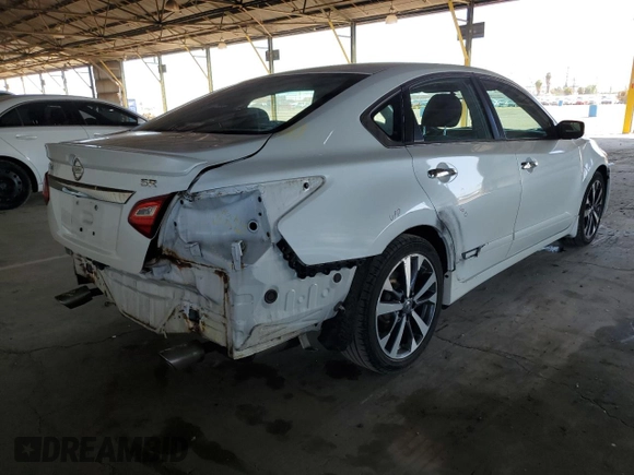 2016 Nissan Altima SL with VIN 1N4AL3AP0GC272698, listed as a Copart auction lot 52001905 with 126,324 mi miles and Salvage title. Bid and sale history available at DreamBid. Image 3.